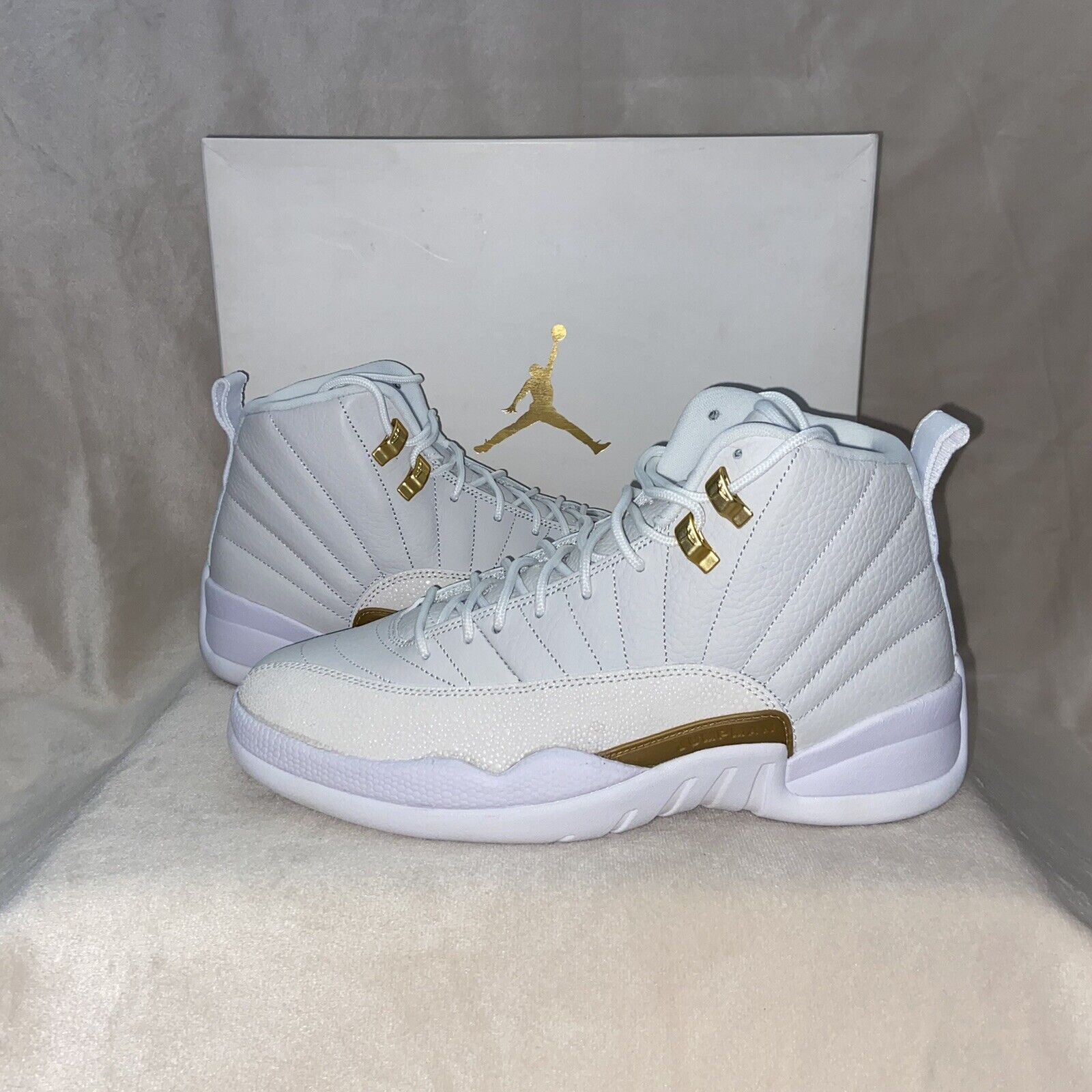 An Icon Unveiled: Delving Deep into the OVO x Air Jordan 12 Retro 'White.'